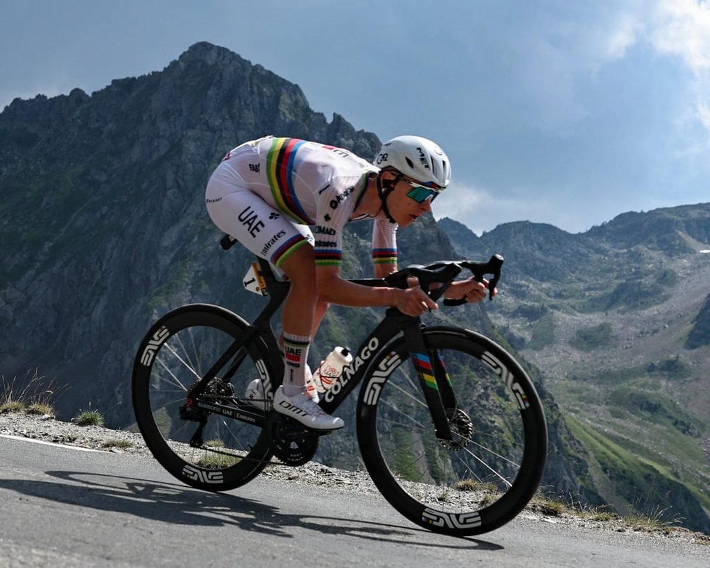 Tadej Pogačar celebrating a stage victory in a professional road cycling race
