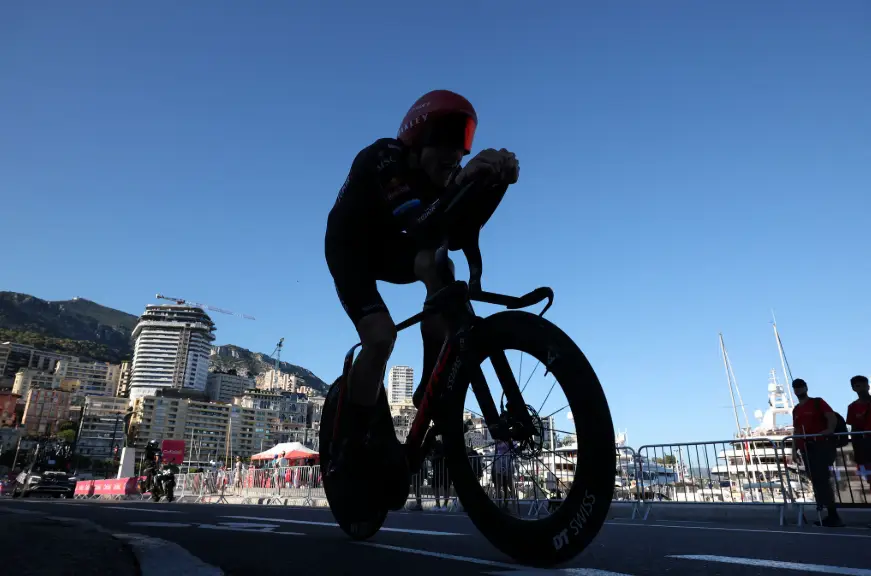 Stefan Küng Tudor Pro Cycling time trial rider in aero position on stage 18.