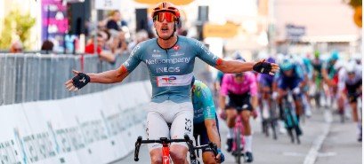 Dorian Godon crossing the finish line in victory at Gran Piemonte 2026 in Bra.